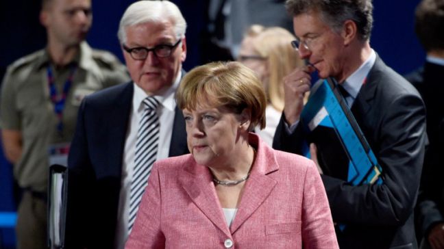 German chancellor Angela Merkel (C), her advisor for foreign and security policy, Christoph Heusgen (R), and foreign minister Frank-Walter Steinmeier (L). EPA, RAINER JENSEN